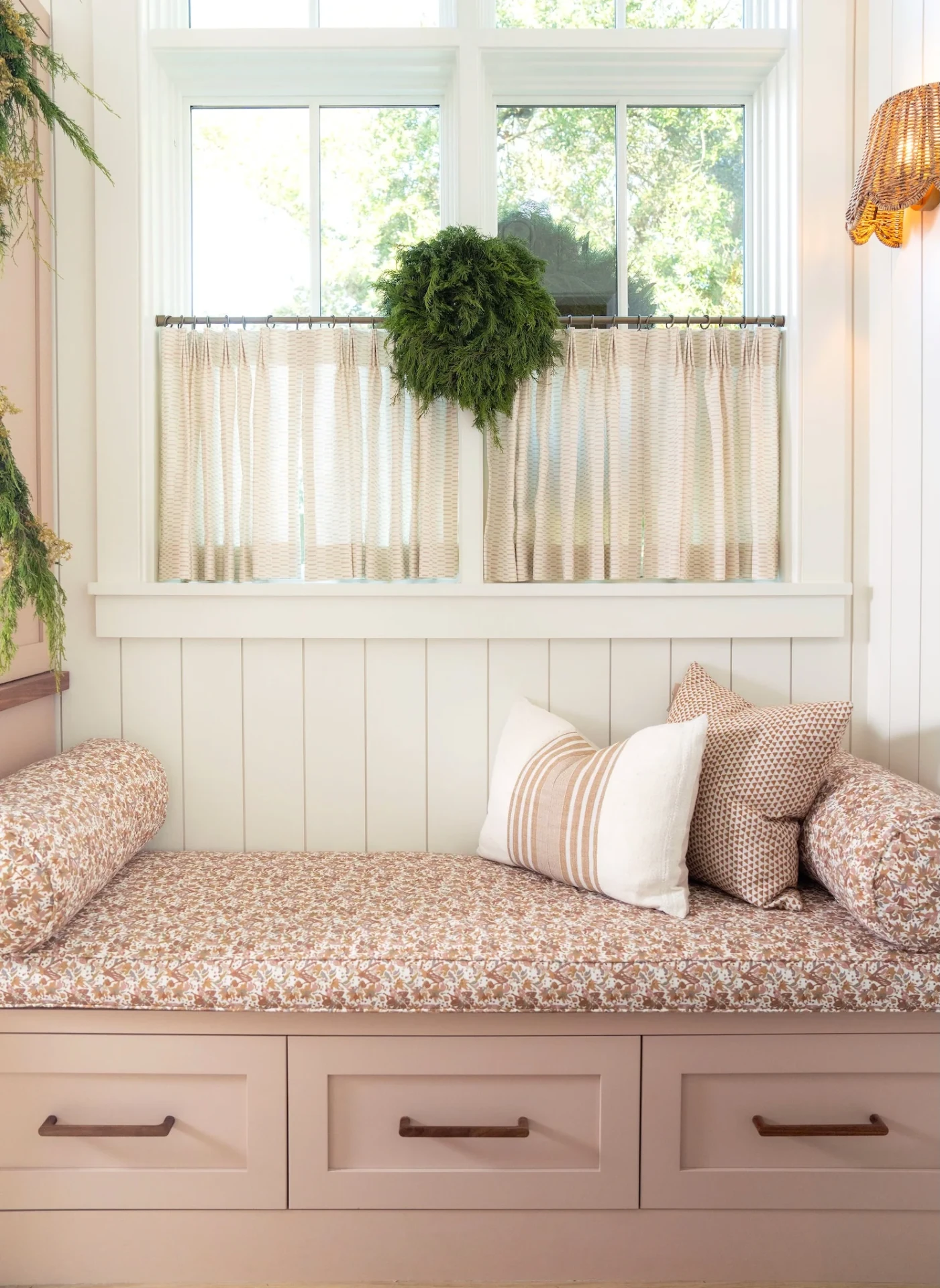 Window bench with pink upholstery, Eden fabric cushions and Sweetgrass cafe curtains