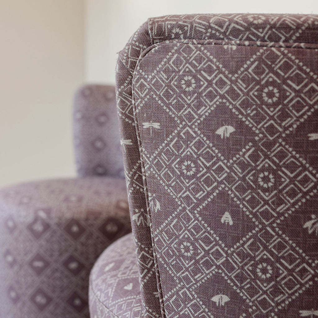 Mauve diamond pattern upholstered chairs